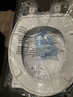 White oval toilet set