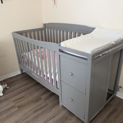 Convertible crib and changer plus changing pad