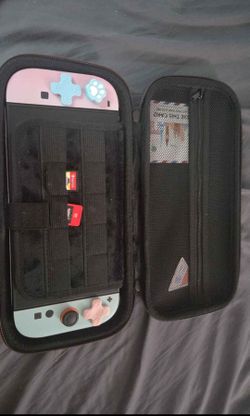 Switch 2 with 2 games and extra switch 1 joycons