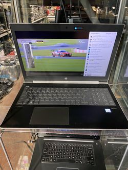 Black and silver HP ProBook 450 G5  laptop with a full keyboard, numeric keypad, and Intel Core i5 processor 8th gen. 8GB RAM . 120 GB SSD. Windows 11