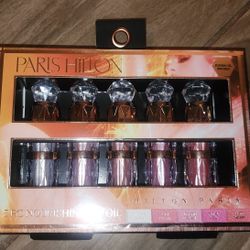 Hilton 5 PC Nourishing Lip Oil Set infused with jojoba oil. 