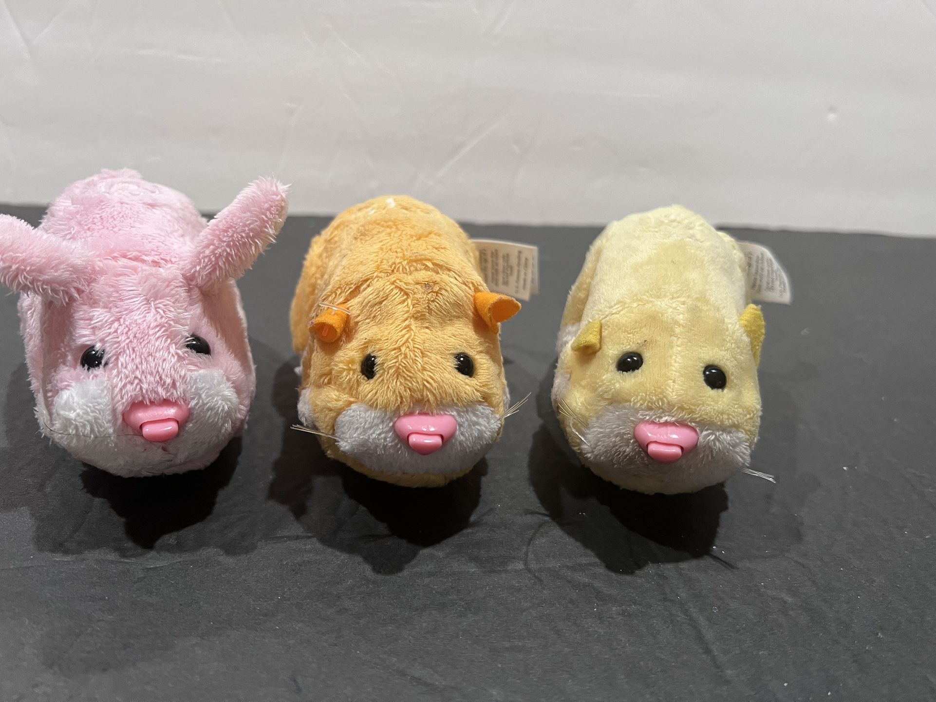 ZHU ZHU PETS!!! PINK BUNNY, ORANGE OR YELLOW HAMSTER! THEY MAKE DIFFERENT SOUNDS ANS MOVE AROUND! $5 EACH ! WILL SELL SEPARATELY!