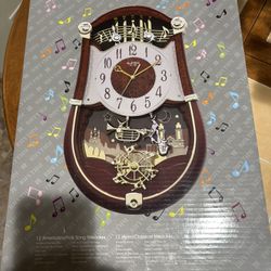 Rhythm Musical Wall Clock – New in Box