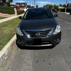 2015 Nissan versa  2000 OBO