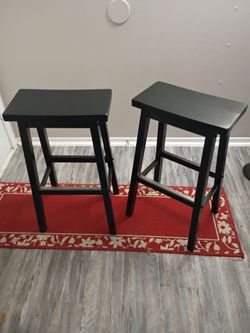 Black, saddle-seat bar stools (2)