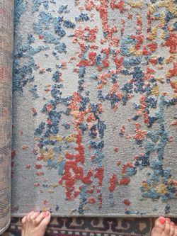 8 x 10 rectangular area rug.  Blues, corals, greys