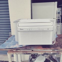like new Madea 12000 BTU window AC works perfect with