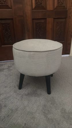 Round Upholstered Ottoman with Wood Legs