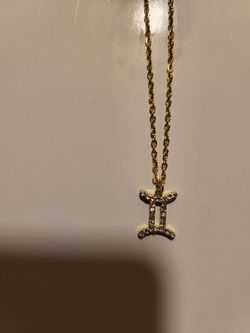Women's silver with gold plated neck
