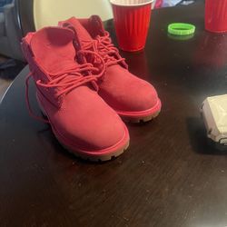 Kids rose red Timberland boot size 11 1/2