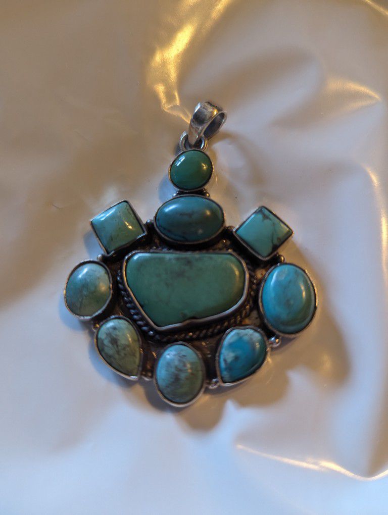 Turquoise And Silver Pendant