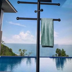 Pool towel rack