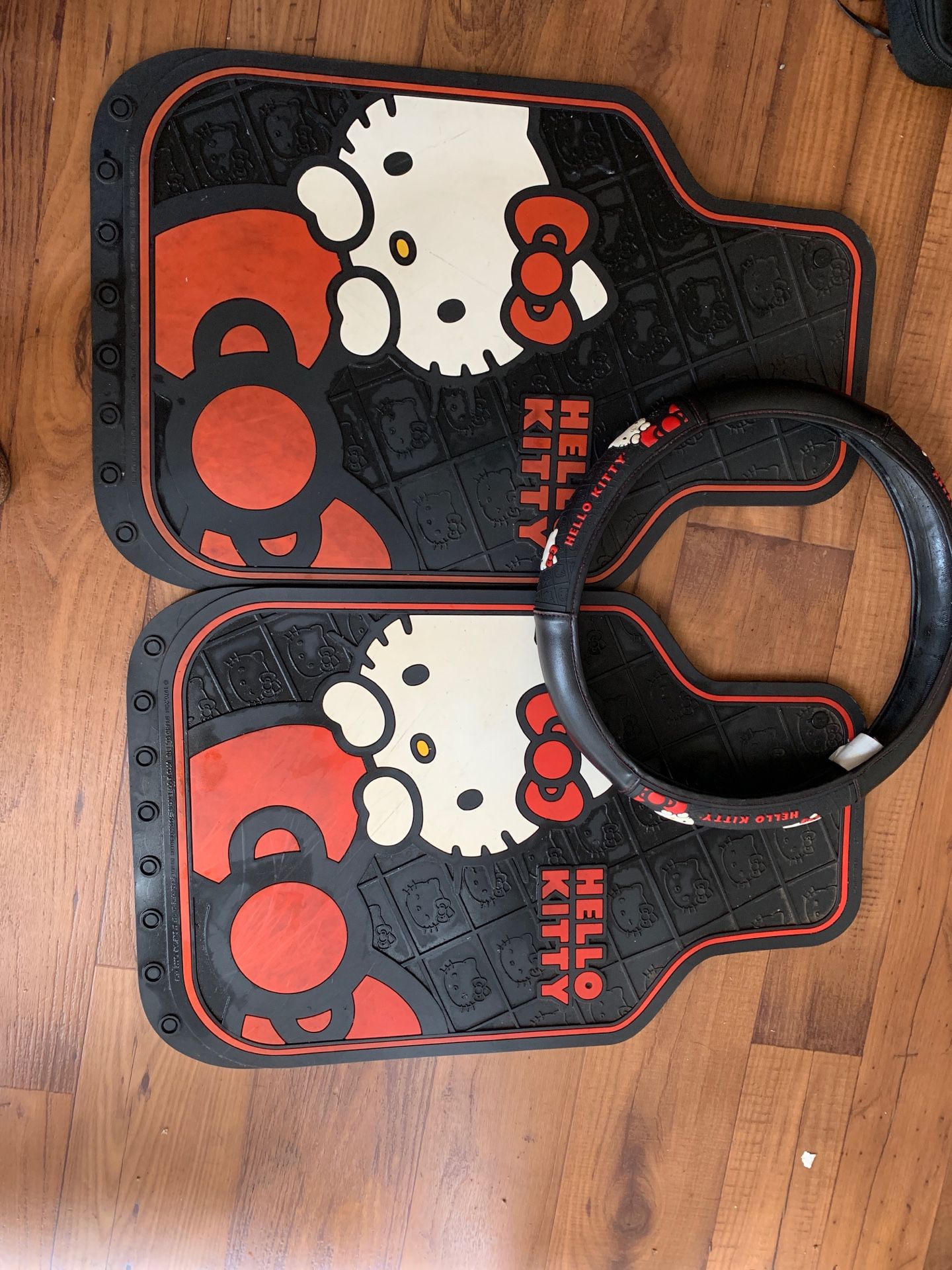 Hello kitty car mats x2 and steering wheel cover