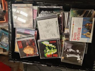 600 various genres CD's in good condition with 5 CD racks