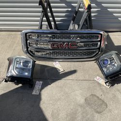 2015 2020 GMC YUKON HEADLIGHT W/ GRILLE OEM 