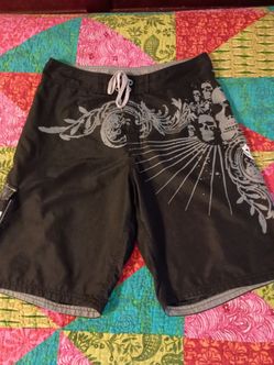 Men's Black Skull Graphic Swim Shorts.