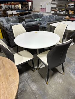 Showroom Display$120.00 Sales As IS !!! New 47” Round Dining Table and 4 Chairs