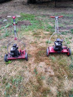Two Toro Gas Push Lawn Mowers