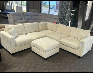 Cream L shaped sectional w/ ottoman