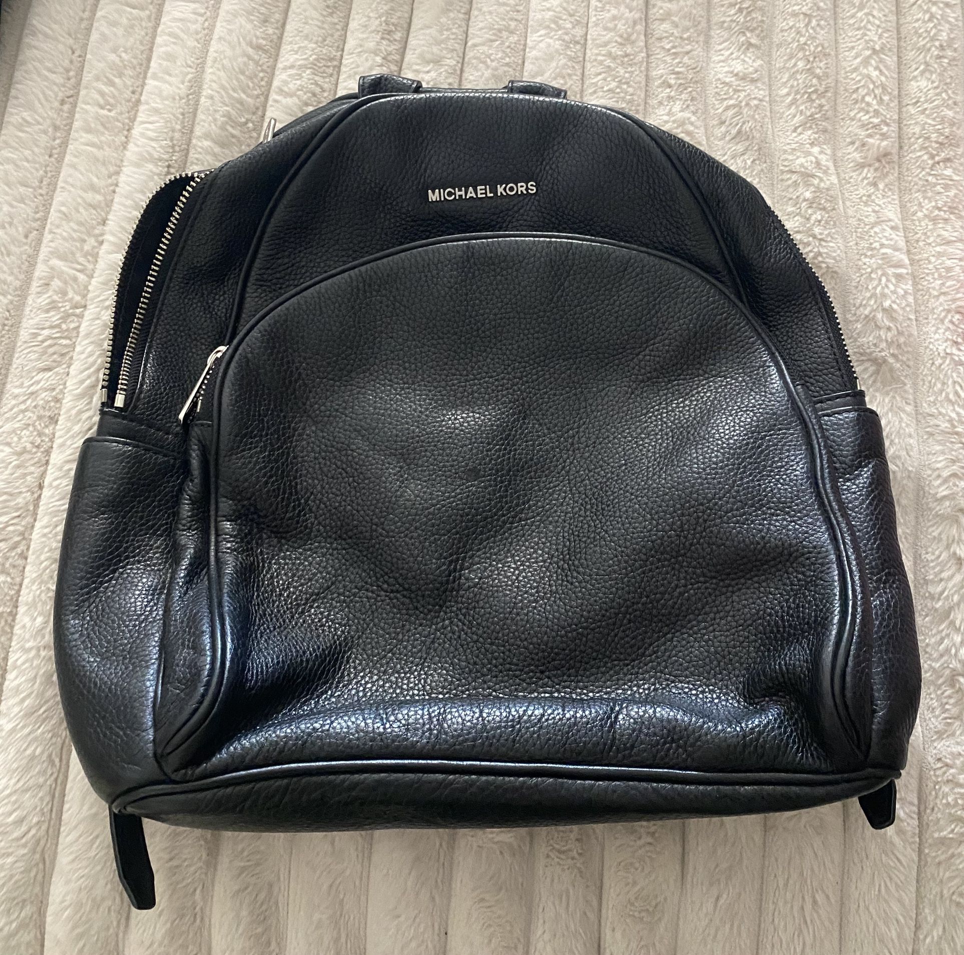 Nice authentic MICHAEL KORS black leather backpack!