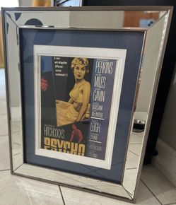 Framed vintage movie poster for the 1960 Alfred Hitchcock film Psycho. 