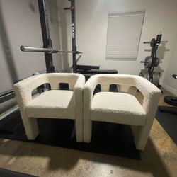 Two Used CB2 Stature Ivory Dining Armchair