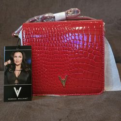 Vanessa Williams brand crossbody bag, specifically a red crocodile-embossed mini bag.