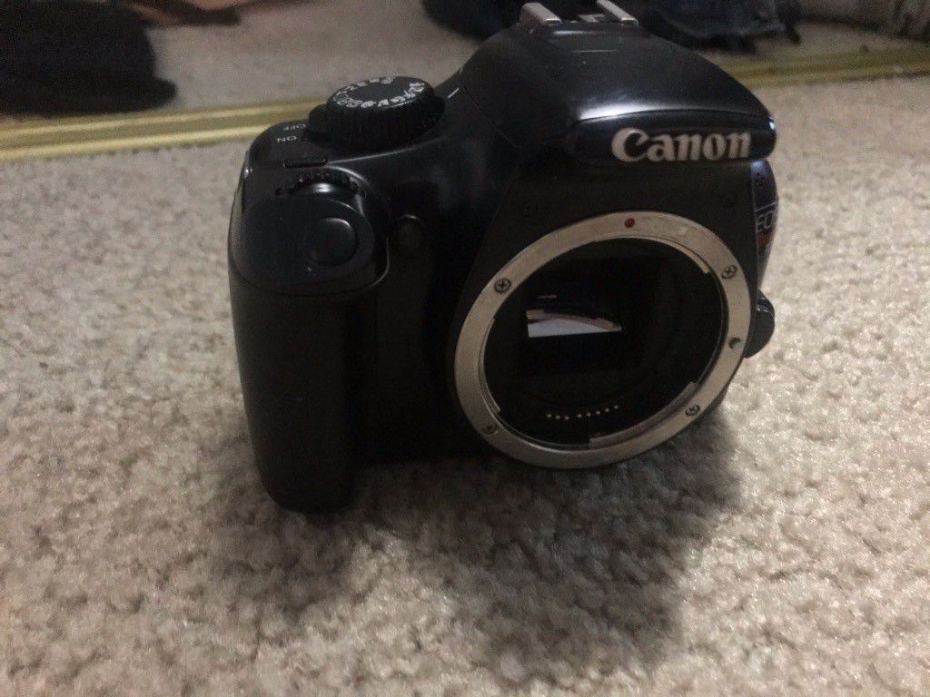 canon DSLR Camera with 50mm addition lense , 2 batteries and charger