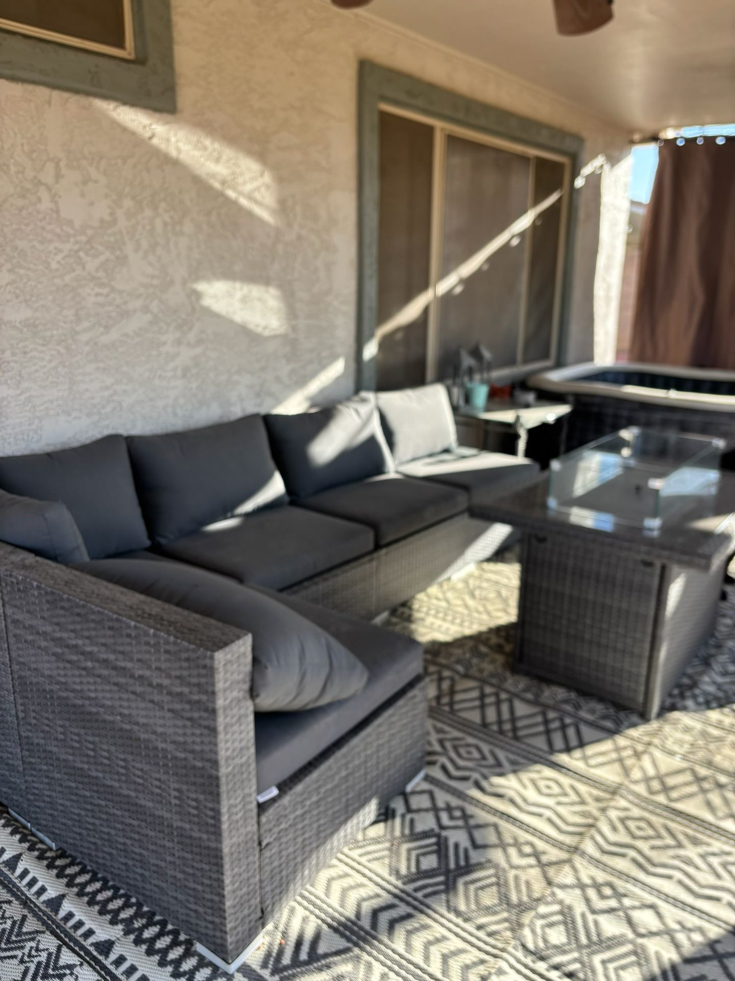 Outdoor patio set with fire pit