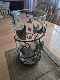 Glass vase with metal casing flower design  5.513