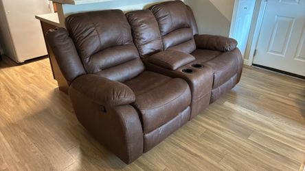 Brown reclining couch set