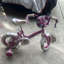 Girls bike with training wheels