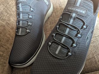 Men black and gray slip in Skechers brand new without tags. Never worn size 11
