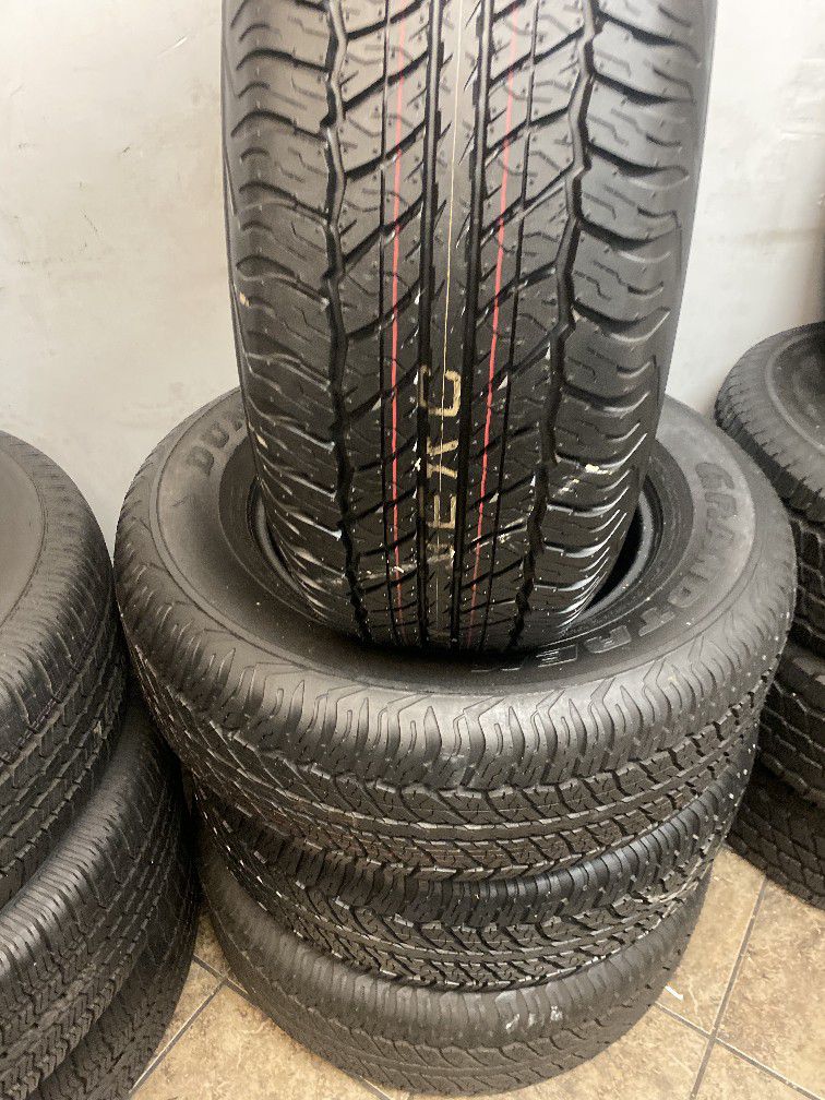 SET FOUR tires 265/70/17 DUNLOP SEMI NEW 95%TREAD LIFE 300 PRICE INCLUDE PROFESSIONAL INSTALLATION AND TAX