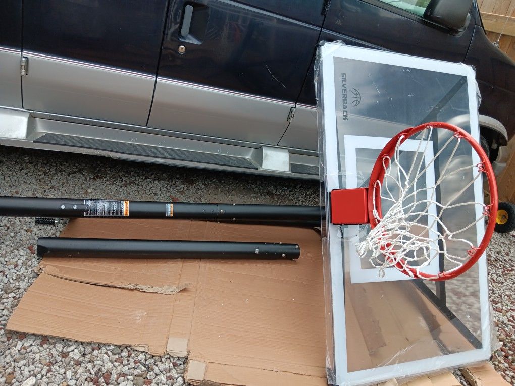 New Silverback SBX 54" In-Ground Basketball Hoop with Adjustable-Height Backboard.