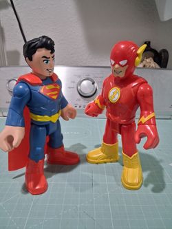 The Fisher Price imaginext DC Super Friends SUPERMAN and FLASH XL action figures.  Good condition.  25 for both.