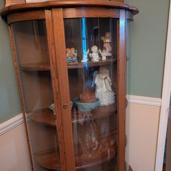 Oak curved glass curio cabinet