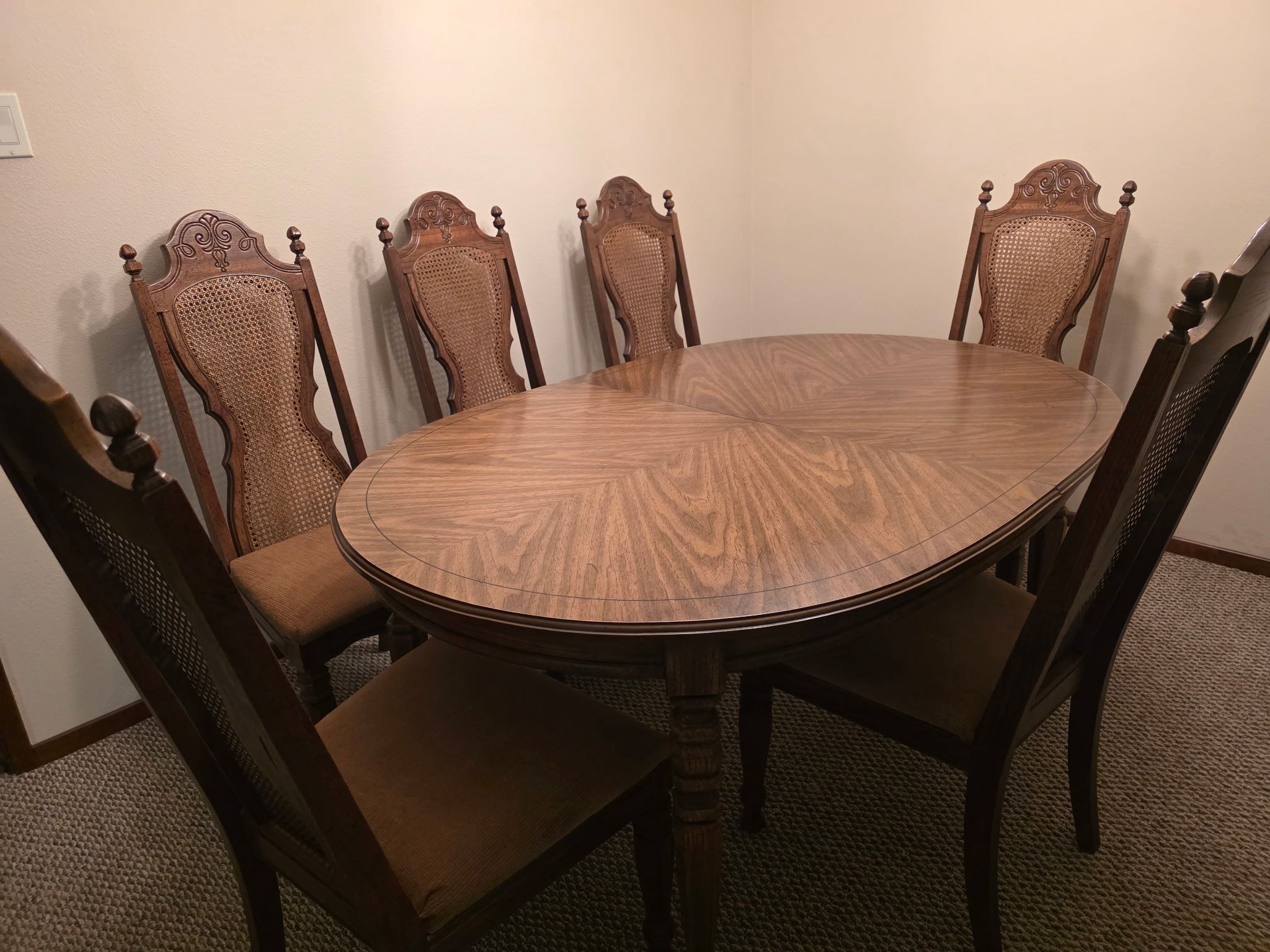 Vintage Dining Table with 6 Cane-Back Chairs – Oval, Seats 6