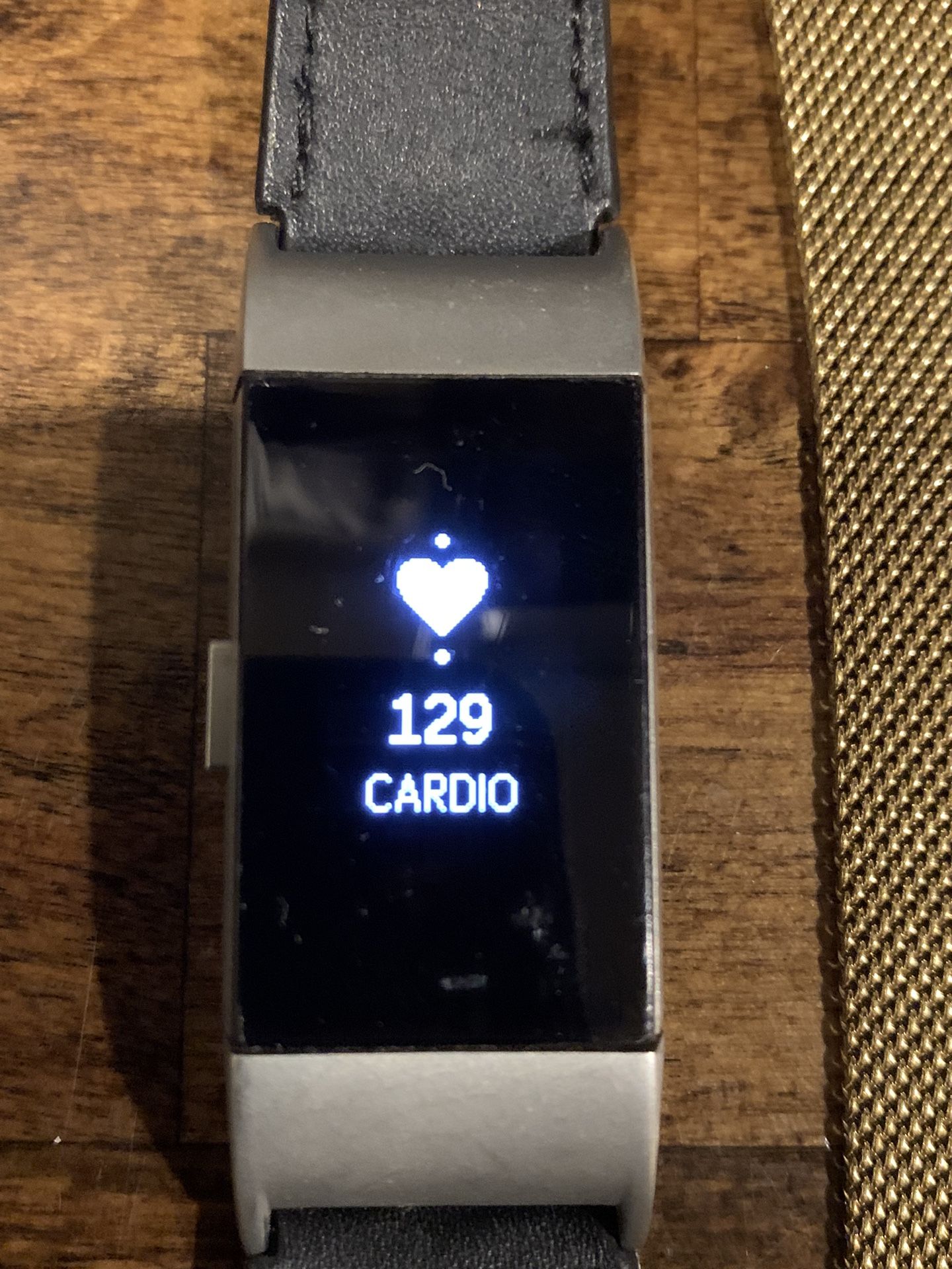 Practically New Fitbit Watch With (8 ) Bands