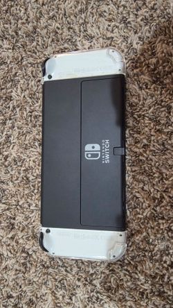 Nintendo Switch OLED international edition + 2 games + protector + carrying case