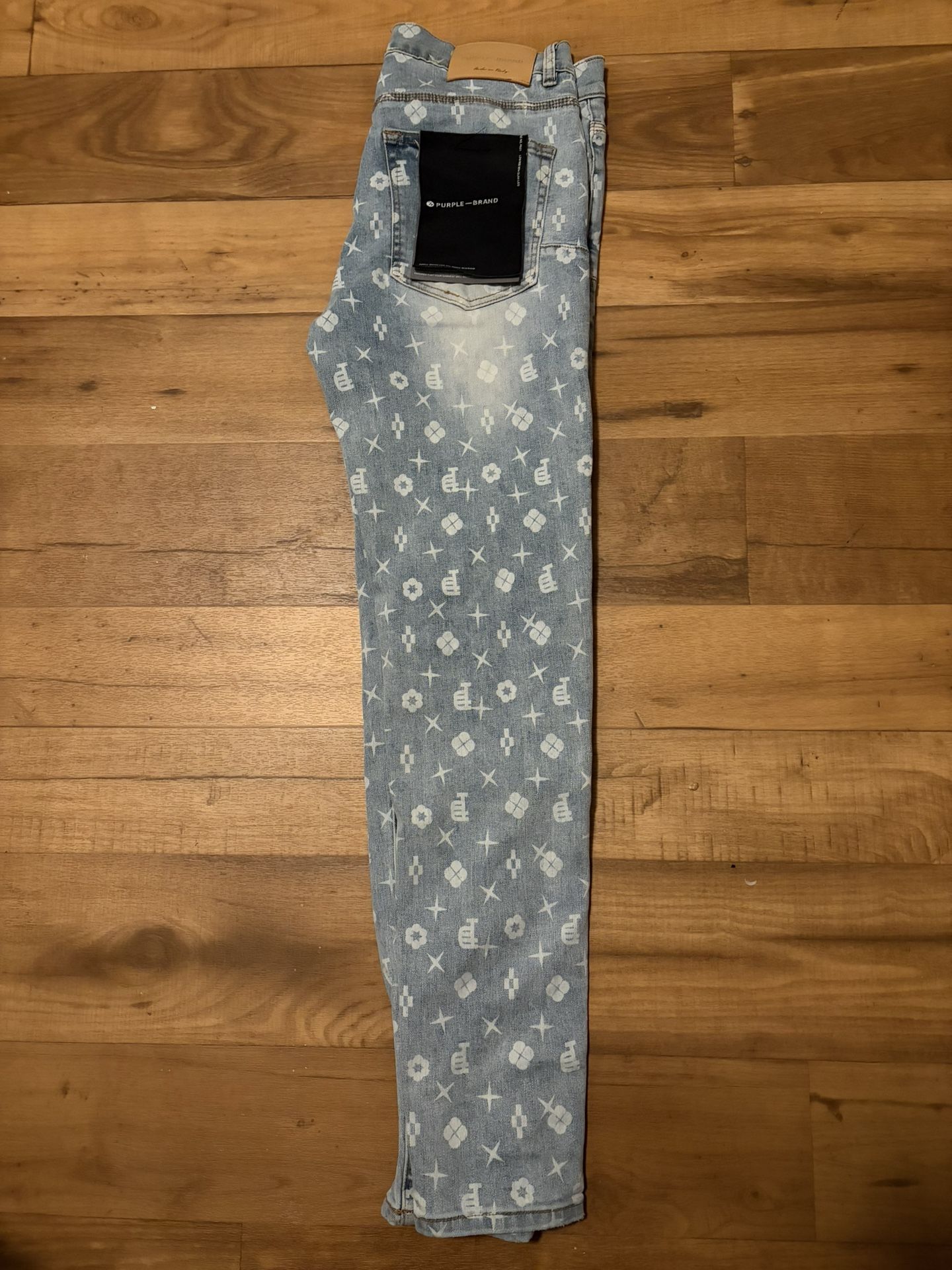 “BLACK TAG MADE IN ITALY PURPLE JEANS”