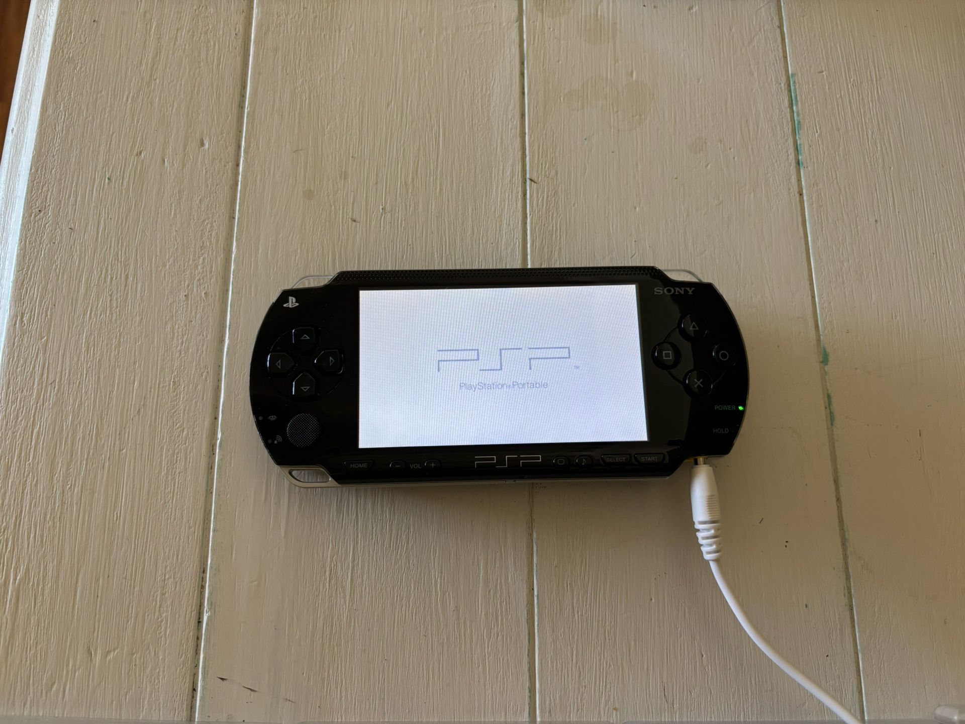 PSP -1001 PlayStation Portable (3 games + 2 Movies)