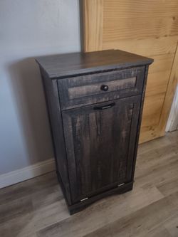 Brand new Ashley wood organizer 38x21x14 Heavy duty. Perfect for tall trash can.
