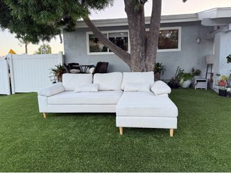 two-piece, bone-colored L-shaped sofa /couch