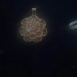 Golden flower pendant