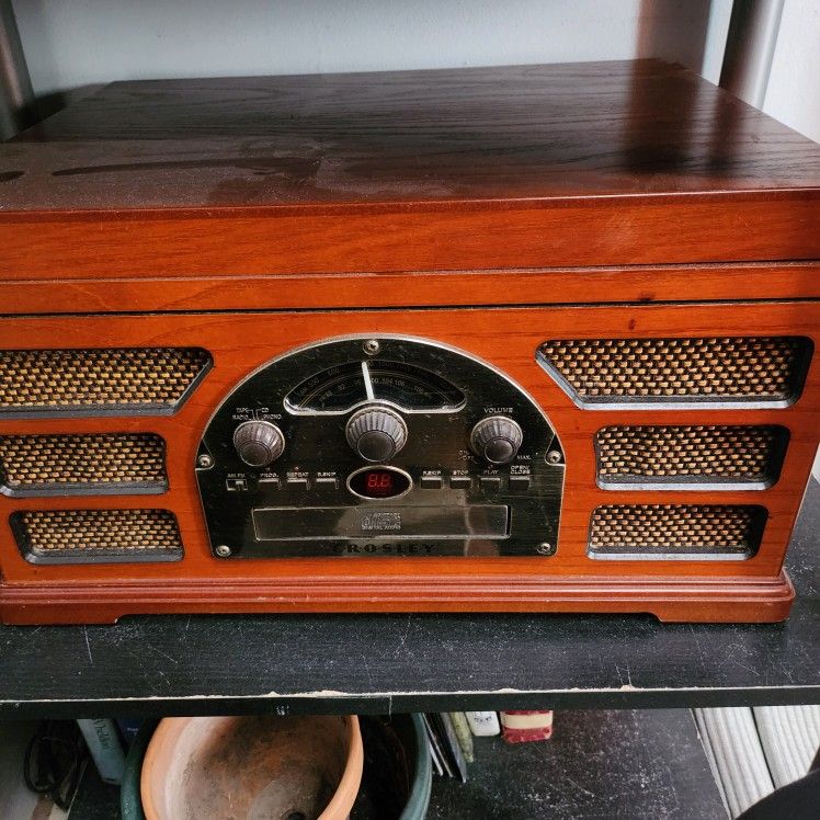 Crosby Stereo has Turn Table , Cd, Radio Cassette Player