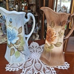 BEAUTIFUL  HAND PAINTED  WATER PITCHERS  HAND PAINTED PORCELAIN  PERFECT CONDITION 10.5 INCHES TALL VERY UNIQUE LOOKING  HAND PAINTED PORCELAIN  