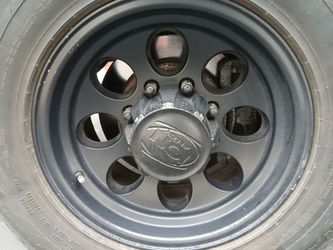 GMC Sierra rims and tires 8 lug...