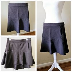 Size Small Free People Grey Cotton Layered Flared Skirt with Elastic Waist. 96% Cotton, 4% Elastane. New with Tags!

Measures 16" Long in the front an