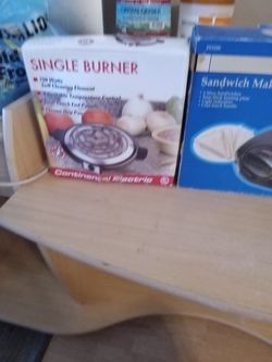 Small electrical appliances and for beautiful orange coffee cups.